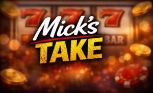 Text‑only banner showing the words ‘Mick’s TAKE’ in bold white and distressed yellow lettering with a red underline, set against a blurred slot‑machine background featuring 7s and gold coins.